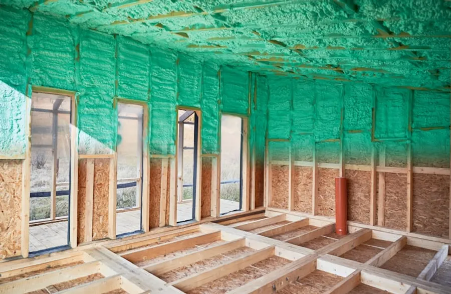Healthy home renovation with exposed framing and insulation