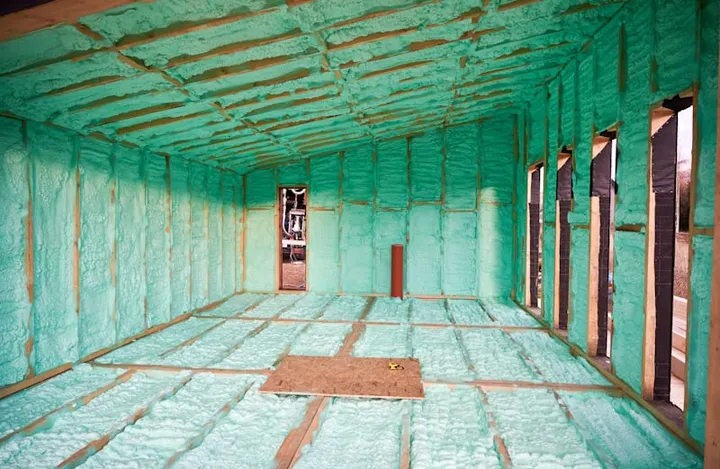 Spray foam insulation installed in a building assembly